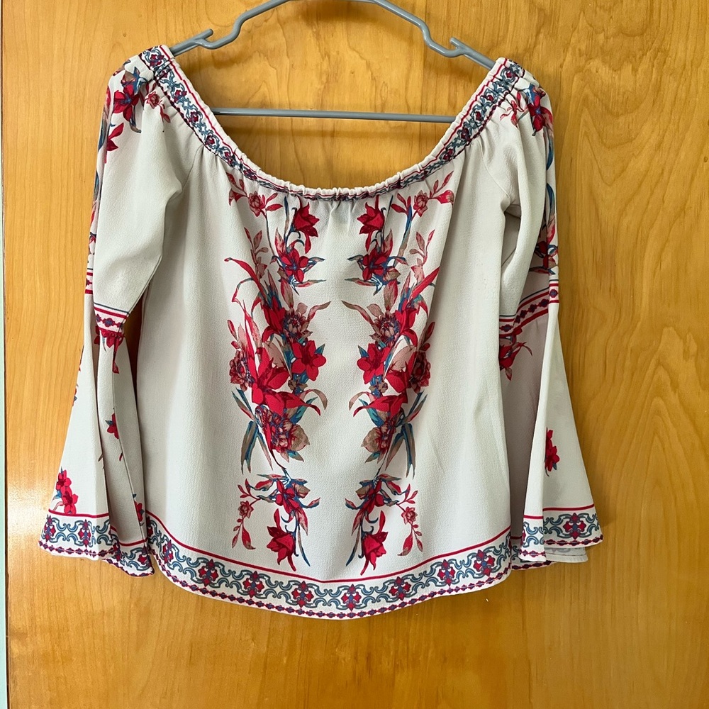 Floral Off-the-shoulder blouse with beautiful blue and red design on cream